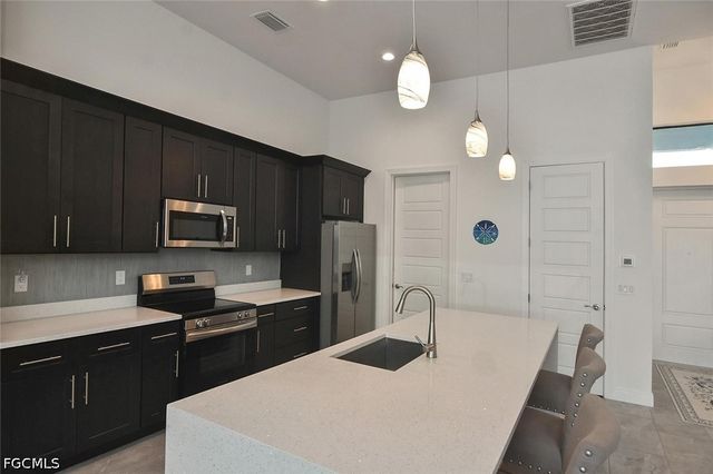 4129 SW 14th AVE, Cape Coral, FL 33914