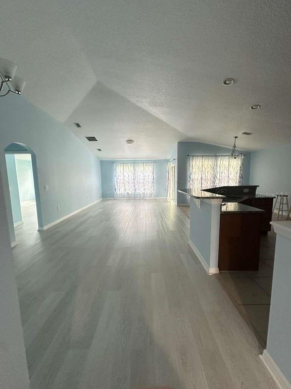 Image 2 of property listing at 10816 CABBAGE TREE LOOP, Orlando, FL 32825