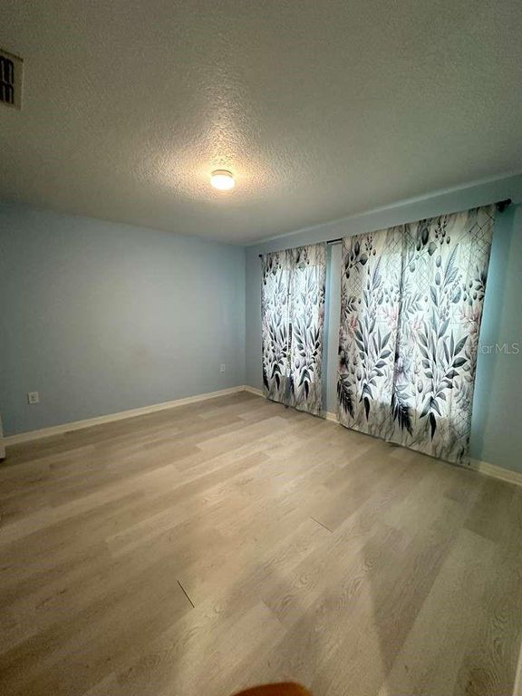 Image 16 of property listing at 10816 CABBAGE TREE LOOP, Orlando, FL 32825
