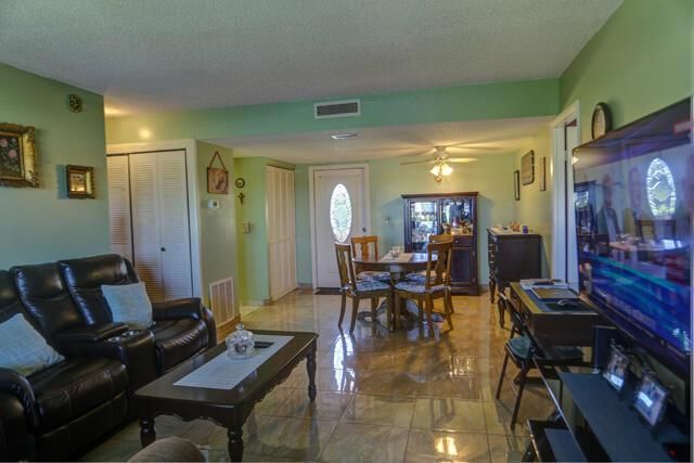 235 Golden River Drive, West Palm Beach, FL 33411