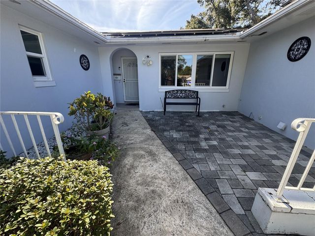 1702 HICKORYWOOD LANE, Orlando, FL 32818