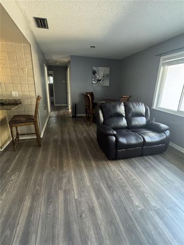 1702 HICKORYWOOD LANE, Orlando, FL 32818