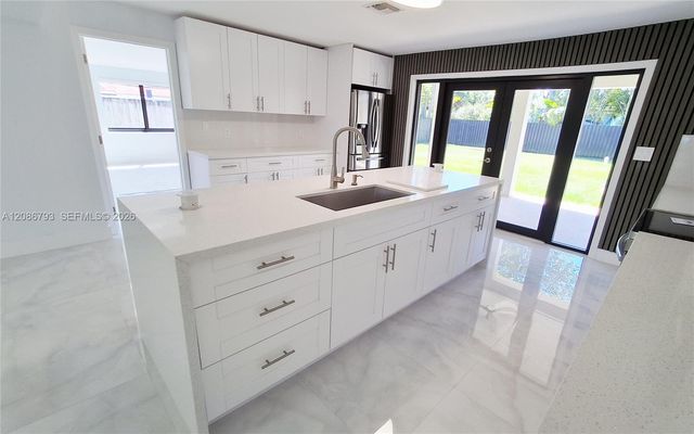 216 Shadow Way, Miami Springs, FL 33166