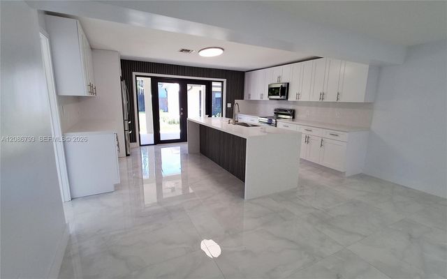 216 Shadow Way, Miami Springs, FL 33166