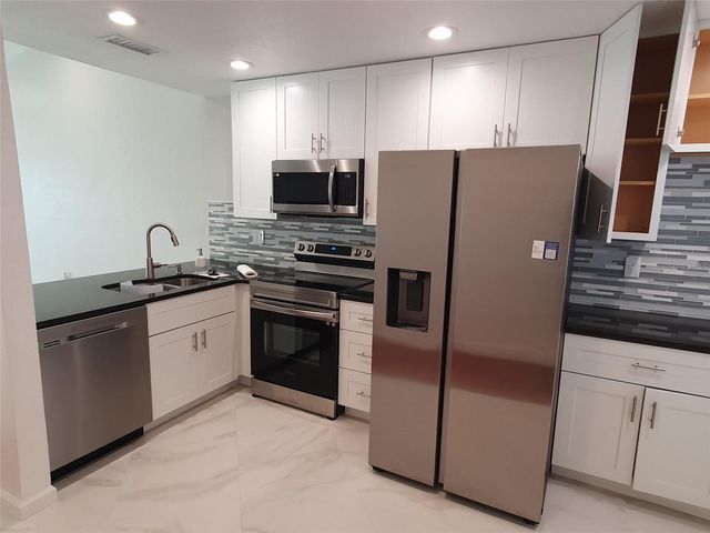 1887 ORANGE BOULEVARD WAY, Palm Harbor, FL 34683