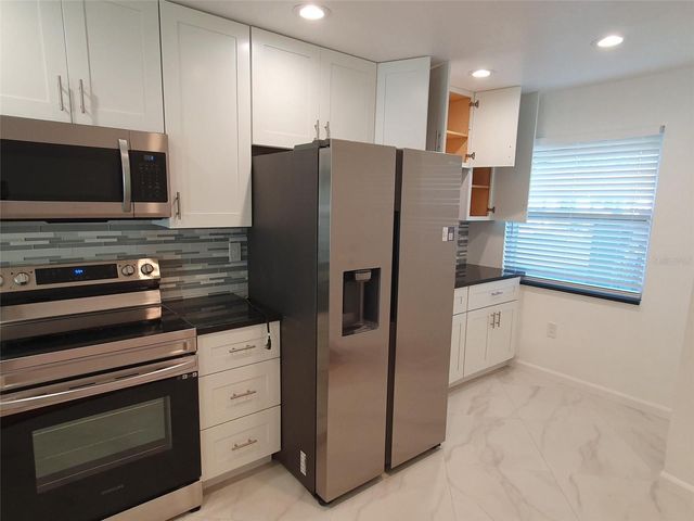 1887 ORANGE BOULEVARD WAY, Palm Harbor, FL 34683