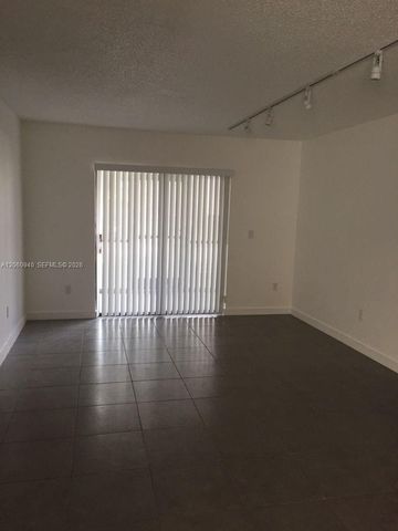 860 NE 209th Ter 104-33, Miami, FL 33179