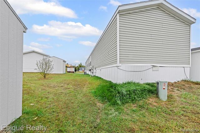 83 Elm Avenue, Highland, MI 48357