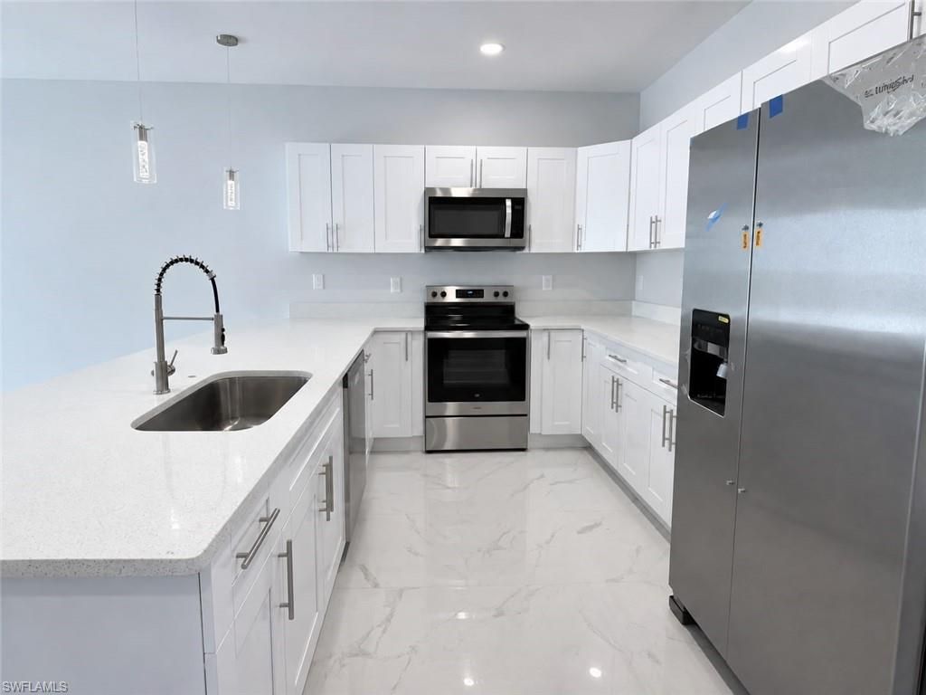 2405/2407 Xelda AVE N, LEHIGH ACRES, FL 33971 — photo 2