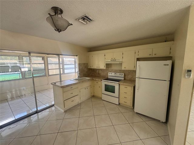 2309 NW 54th St, Tamarac, FL 33309