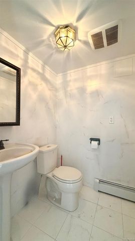 9904 74th Avenue, Forest Hills, NY 11375