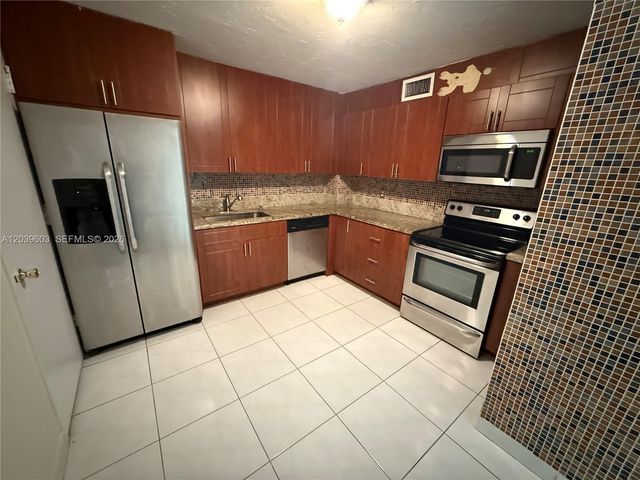 401 Golden Isles Dr 202, Hallandale Beach, FL 33009