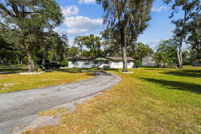 25309 Carnoustie Drive, Sorrento, FL 32776