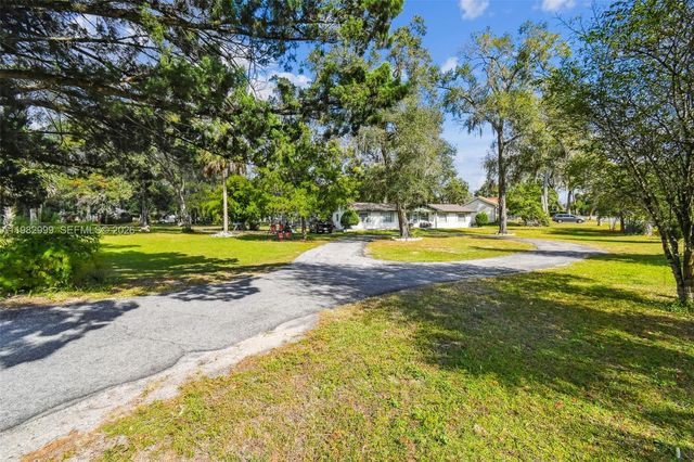 25309 Carnoustie Drive, Sorrento, FL 32776