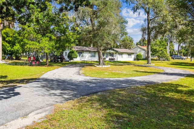 25309 Carnoustie Drive, Sorrento, FL 32776