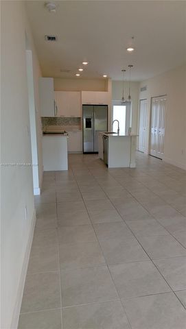 8001 NW 41st Street F-204, Doral, FL 33166