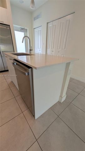 8001 NW 41st Street F-204, Doral, FL 33166