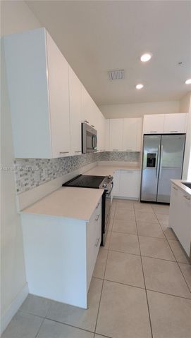 8001 NW 41st Street F-204, Doral, FL 33166