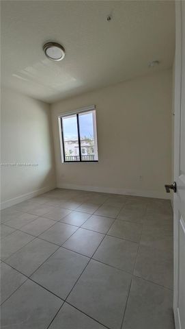 8001 NW 41st Street F-204, Doral, FL 33166
