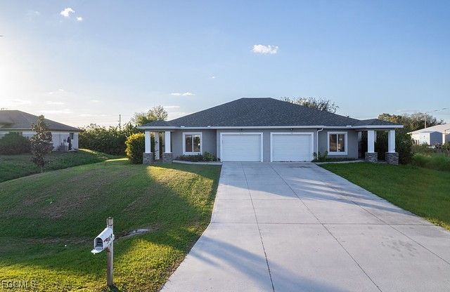 390 Pennfield AVE, Lehigh Acres, FL 33974