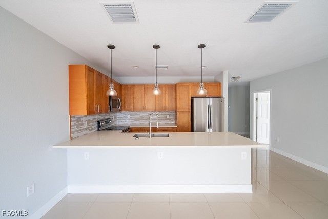 390 Pennfield AVE, Lehigh Acres, FL 33974