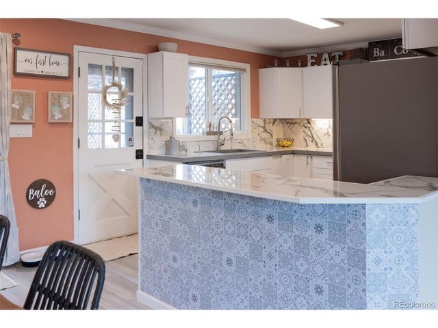 3791 W Wagon Trail Dr, Littleton, CO 80123