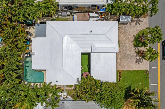 1166 Beach Road, Singer Island, FL 33404