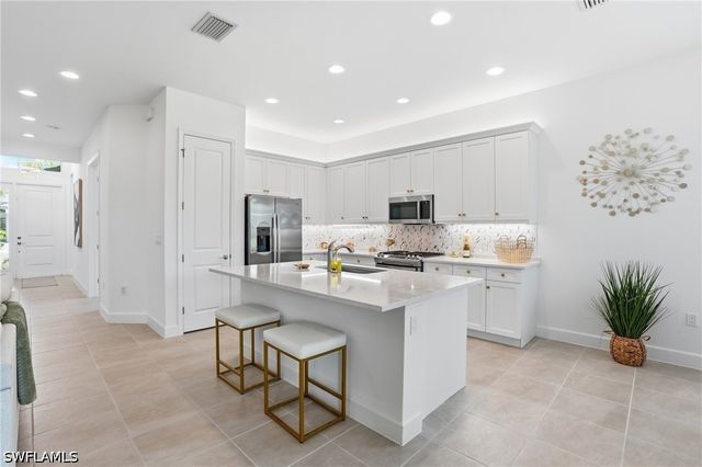 12349 Dahlia CT, Naples, FL 34120