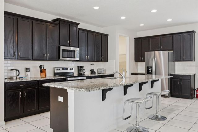 9008 SUNSHINE RIDGE LOOP, Kissimmee, FL 34747