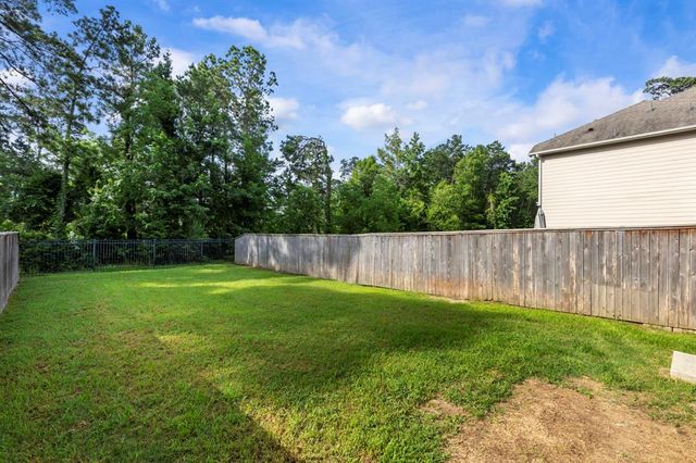 211 Moon Dance Court, Conroe, TX 77304
