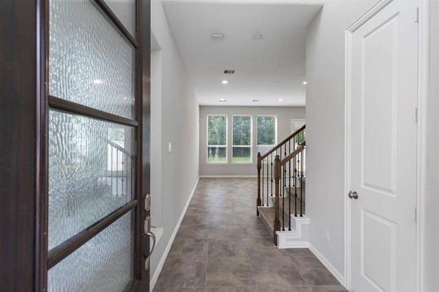 211 Moon Dance Court, Conroe, TX 77304