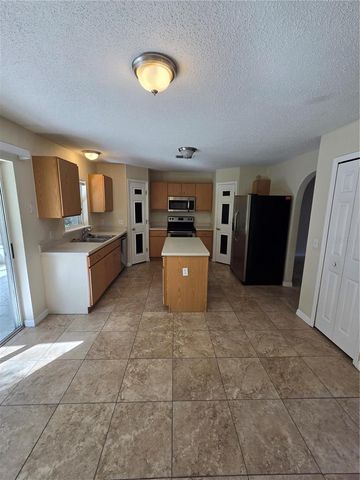 9442 WATER FERN CIRCLE, Clermont, FL 34711