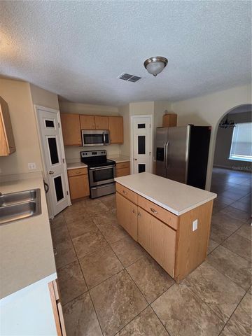 9442 WATER FERN CIRCLE, Clermont, FL 34711