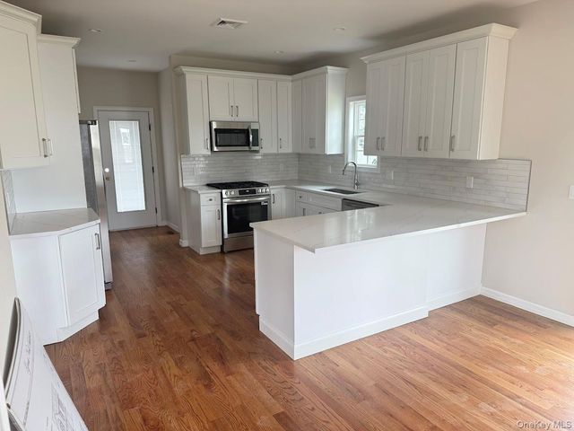 12 Gail Grace Court, Copiague, NY 11726
