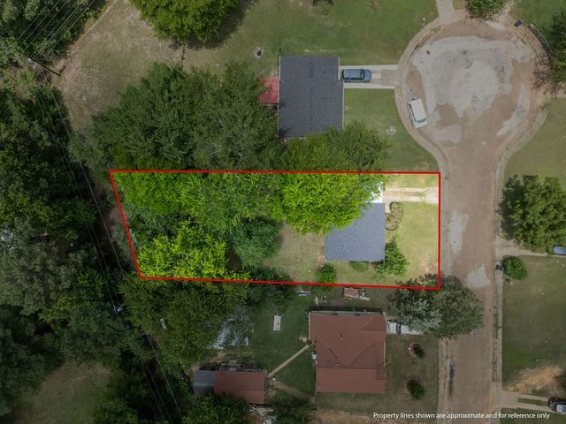 327 Randolph Street, Lone Star, TX 75668