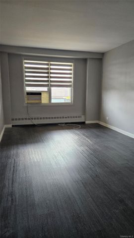 97-37 63rd Road 9M, Rego Park, NY 11374