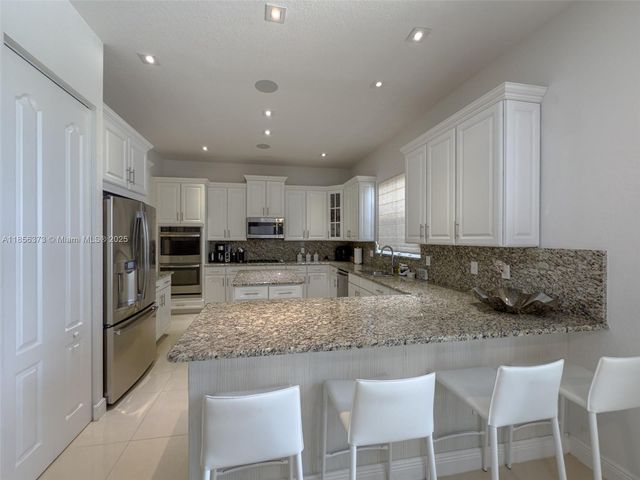 9709 Blue Isle Bay, Parkland, FL 33076