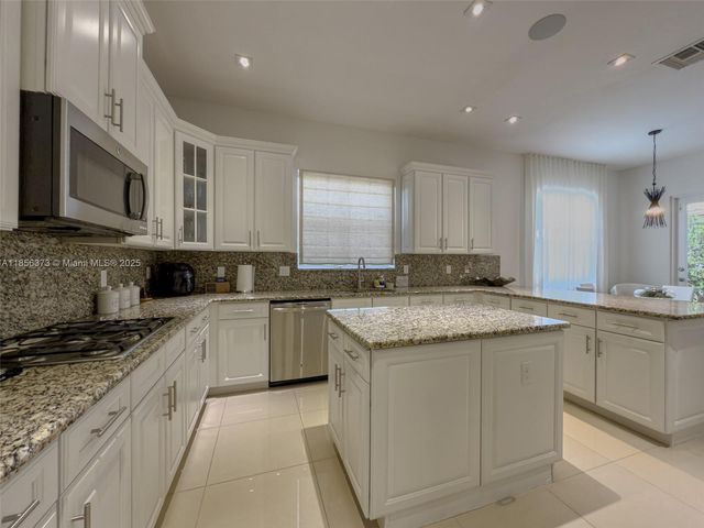 9709 Blue Isle Bay, Parkland, FL 33076