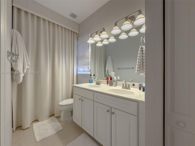 9709 Blue Isle Bay, Parkland, FL 33076