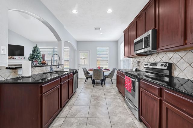 21822 Winsome Rose Court, Cypress, TX 77433