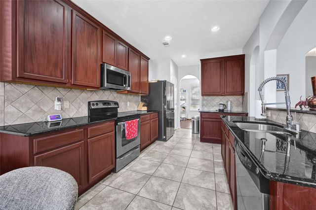 21822 Winsome Rose Court, Cypress, TX 77433