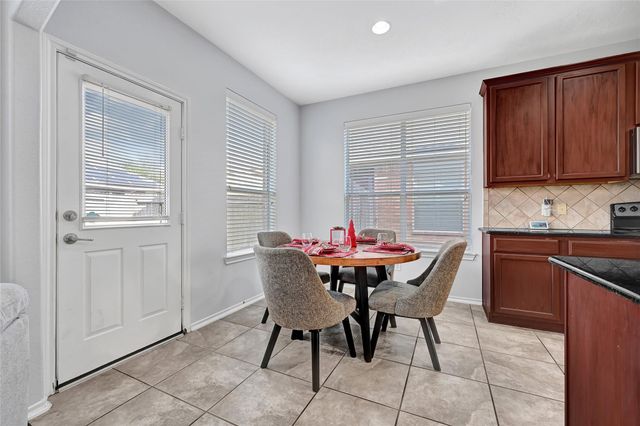 21822 Winsome Rose Court, Cypress, TX 77433