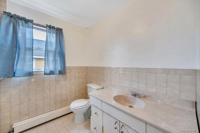 24 Pleasant Avenue, Roosevelt, NY 11575