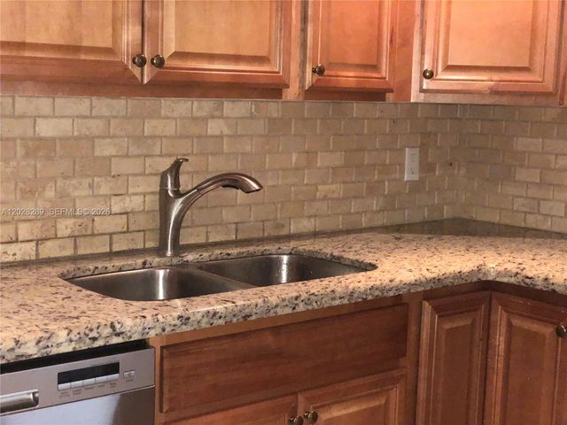 16300 Golf Club Road 105, Weston, FL 33326