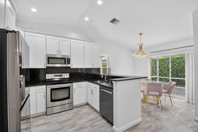 208 Caribe Court, Greenacres, FL 33413