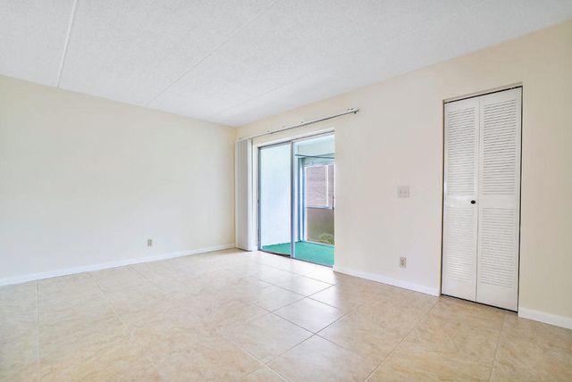 400 VILLAGE GREEN Circle W 102, Palm Springs, FL 33461