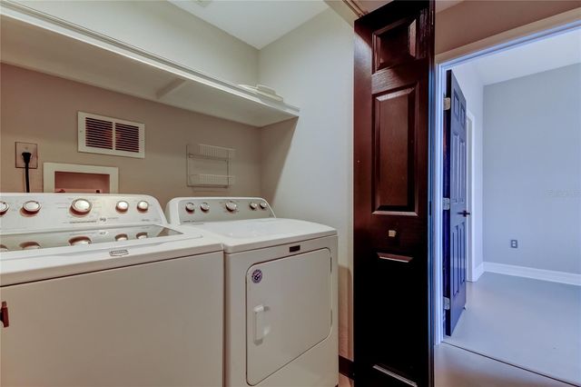 9750 LAKE CHASE ISLAND WAY 9750, Tampa, FL 33626