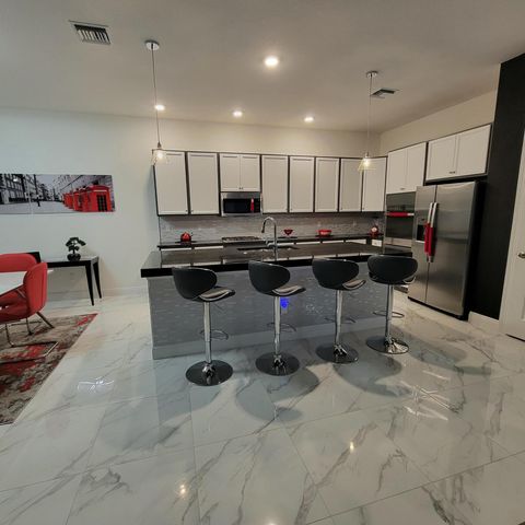 15750 LONGBOAT KEY Drive, Westlake, FL 33470