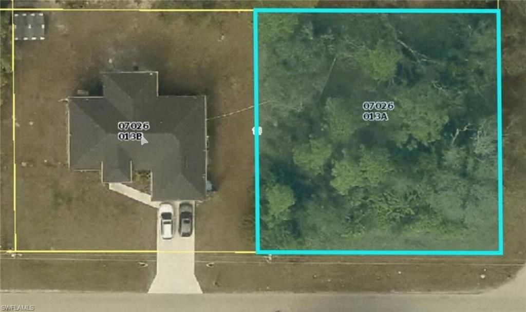 2407 E 18th ST, LEHIGH ACRES, FL 33972 — exterior