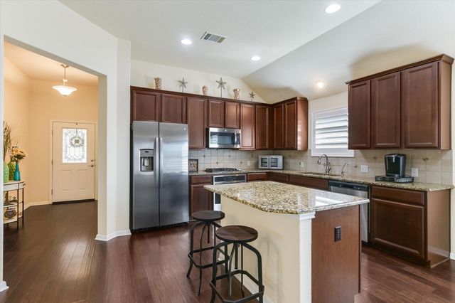 1813 Meandering Meadows DR, Pflugerville, TX 78660